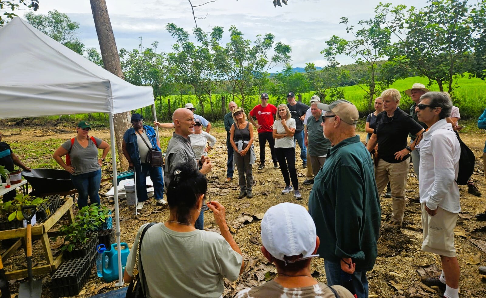 Pristine Lake Bayano surrounded by lush tropical rainforest with traditional dugout canoe on calm turquoise water
